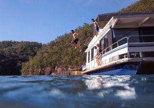 Couples enjoying a day out on the Hawkesbury River on their houseboat.