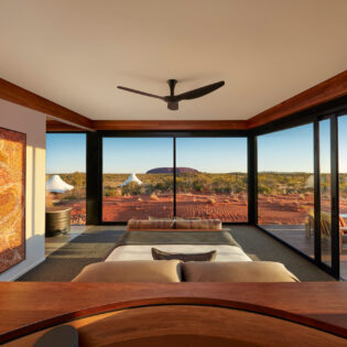 a look inside a luxury tent with scenic views of Uluru at Longitude 131
