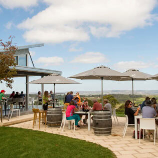 al fresco dining under umbrellas at Pike and Joyce, Lenswood