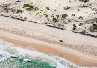 4WD driving along the beach on Worimi Conservation Lands, Port Stephens