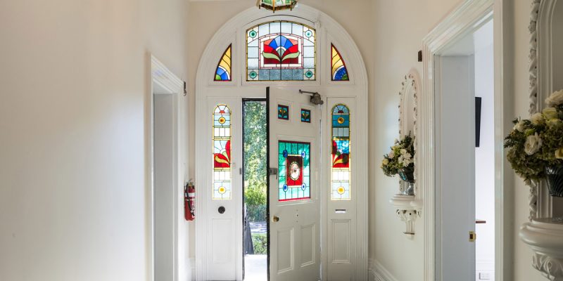 The front door with stain glass windows at The Florance.