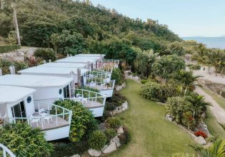 boat-inspired bungalow accommodation at Freedom Shores