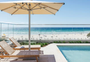 sun loungers by the pool at Kirra Point