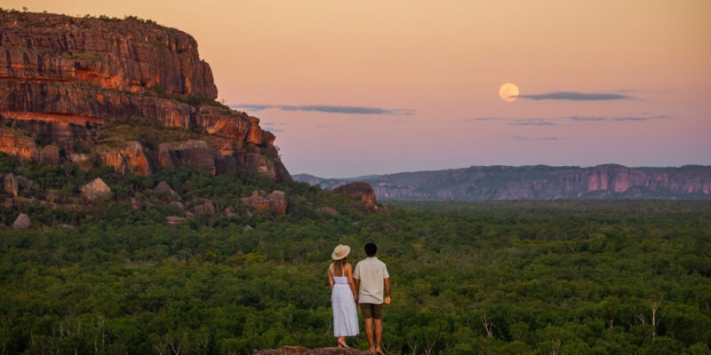 a couple admiring the scenic landscape from Nawurlandja lookout