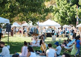 people gathering at Olive Tree Markets