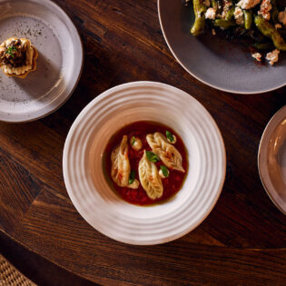 plates of food on the table at at Pilloni, Brisbane