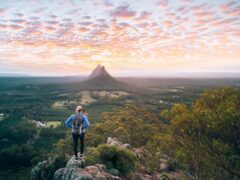 Woman hiking Glasshouse Mountains