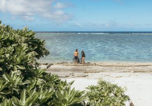Couple walking on Lady Elliot Island at the Eco Resort in Bundaberg