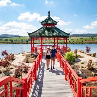 Couple enjoying the spring blooms at Mayfield Garden near Bathurst