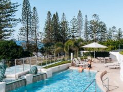 Couple enjoy pool at Oceans Mooloolaba Beach