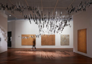 Woman at an exhibition inside the Art Gallery of NSW in Sydney
