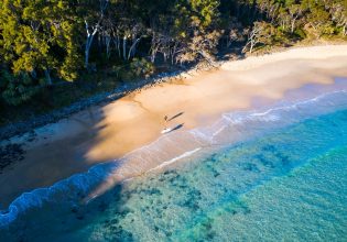 an aerial view of Tea Tree Bay, Noosa National Park