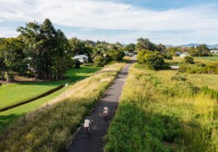 Aerial view of cyclers on the Northern Rivers Rail Trail